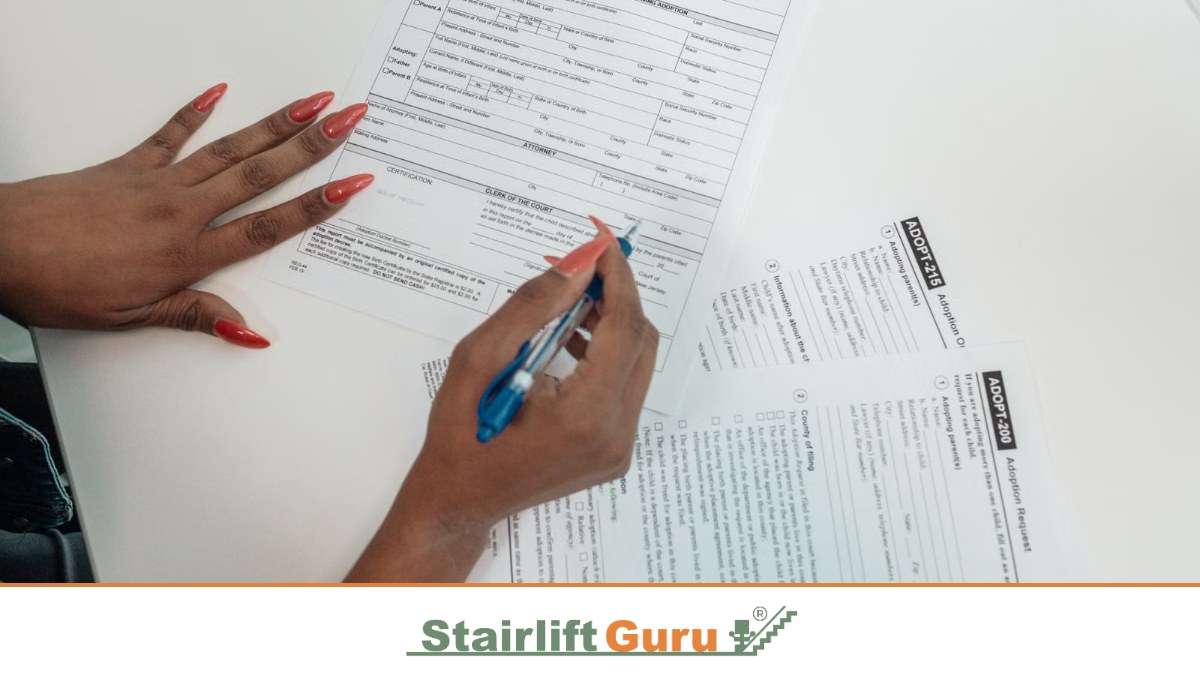 Stairlift Guru grants featured image 1 Filling in a form with a pen