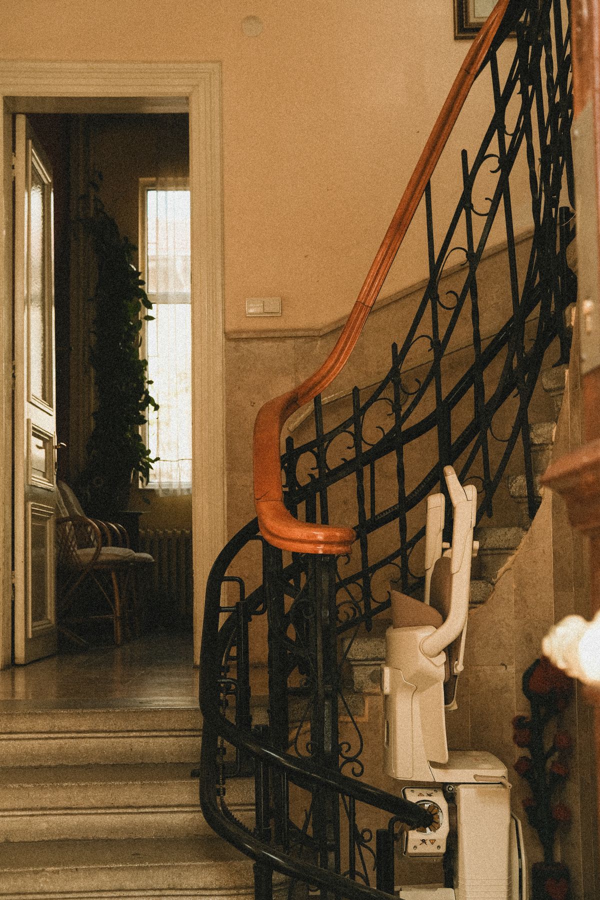Stairlift rail on curved staircase | Stairlift Guru Stairlift rail fitted to a curved staircase in a period home
