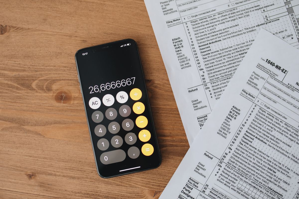 A calculator on top of paperwork