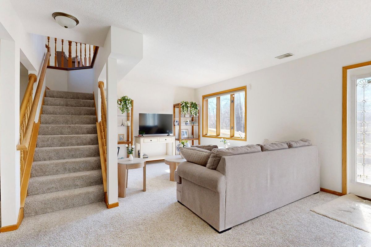 A carpeted staircase in a home A carpeted staircase in a home