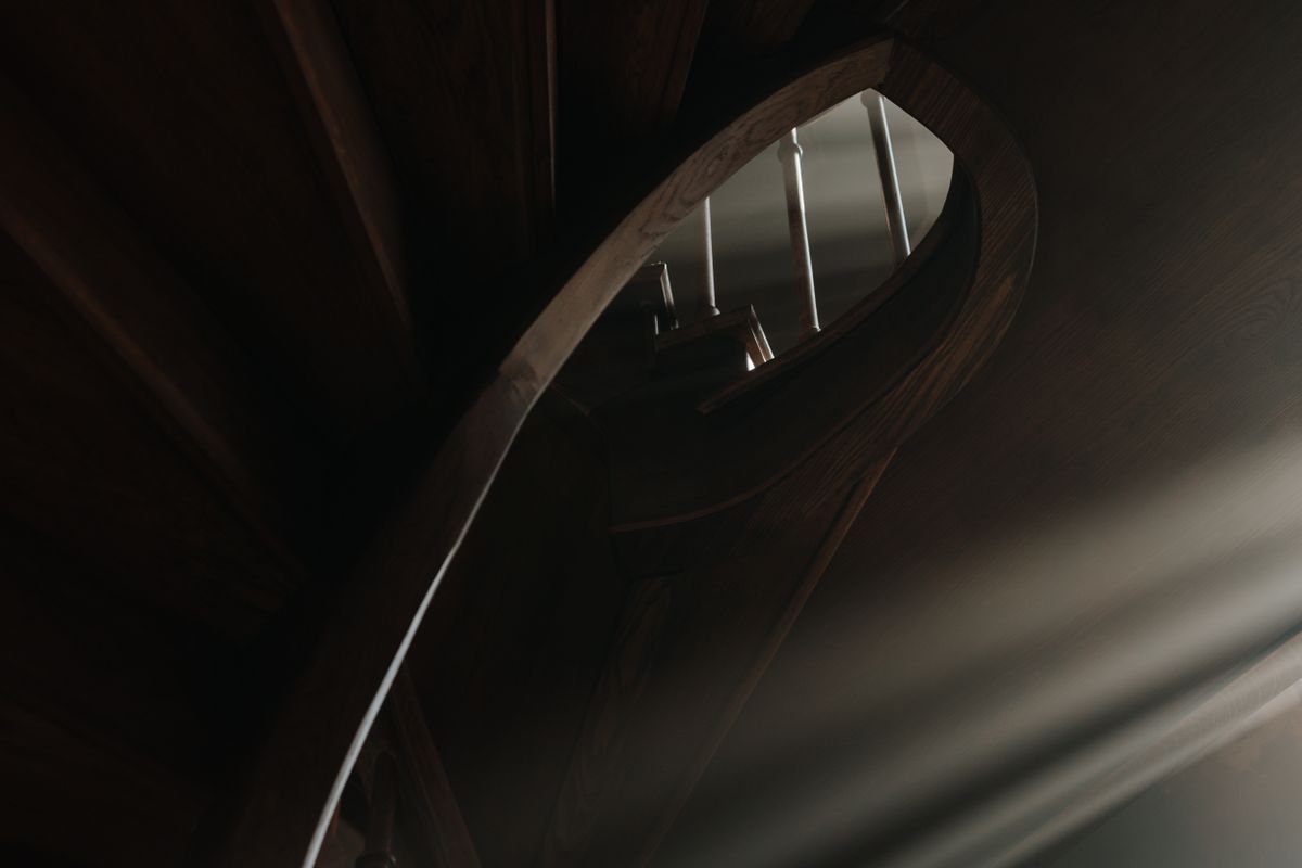 A curved stair rail in low light A curved stair rail in low light