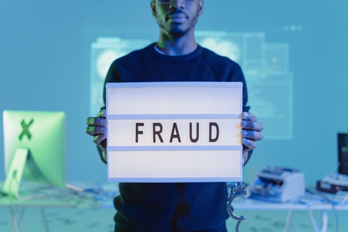 A fraud warning sign A fraud warning sign