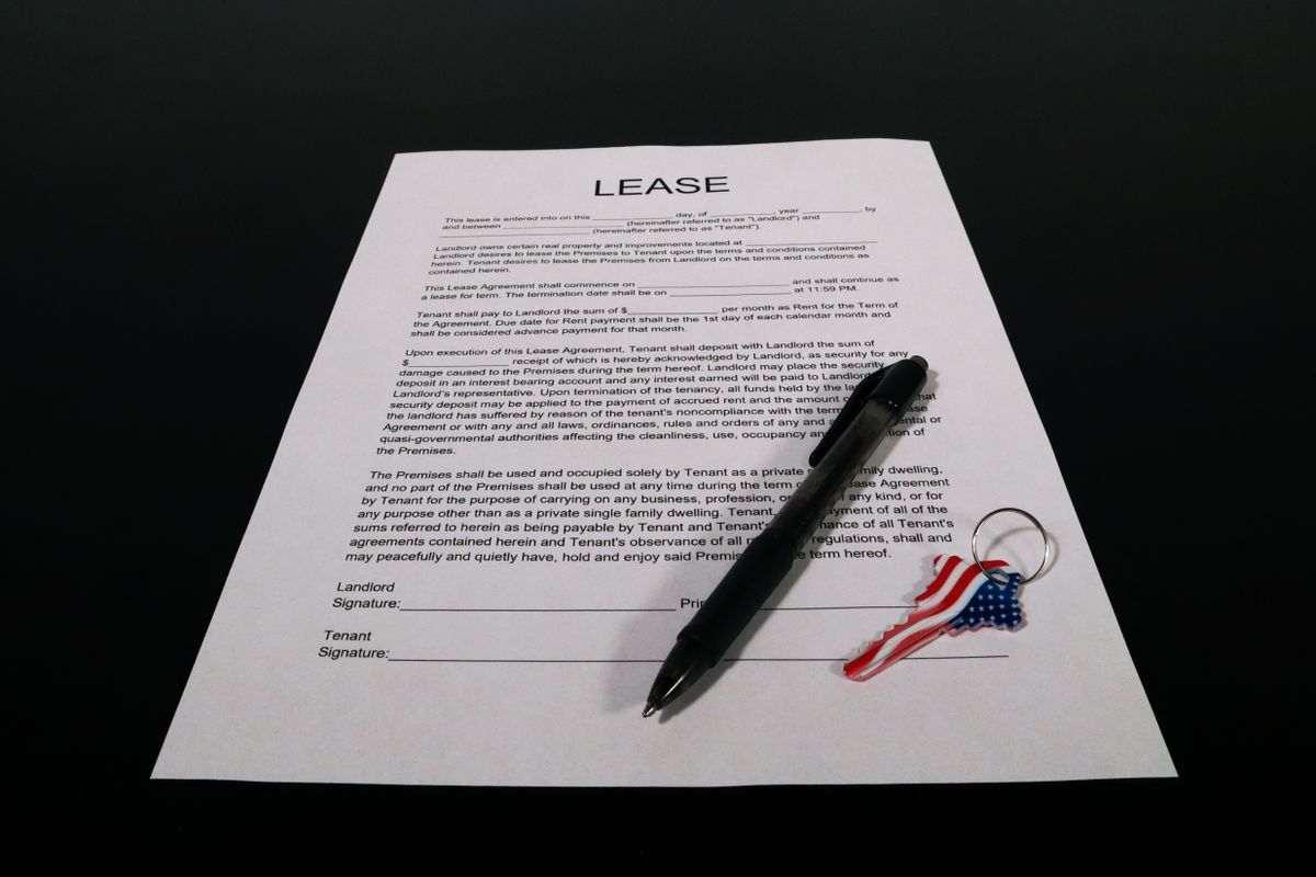 A lease agreement and a pen A lease agreement and a pen