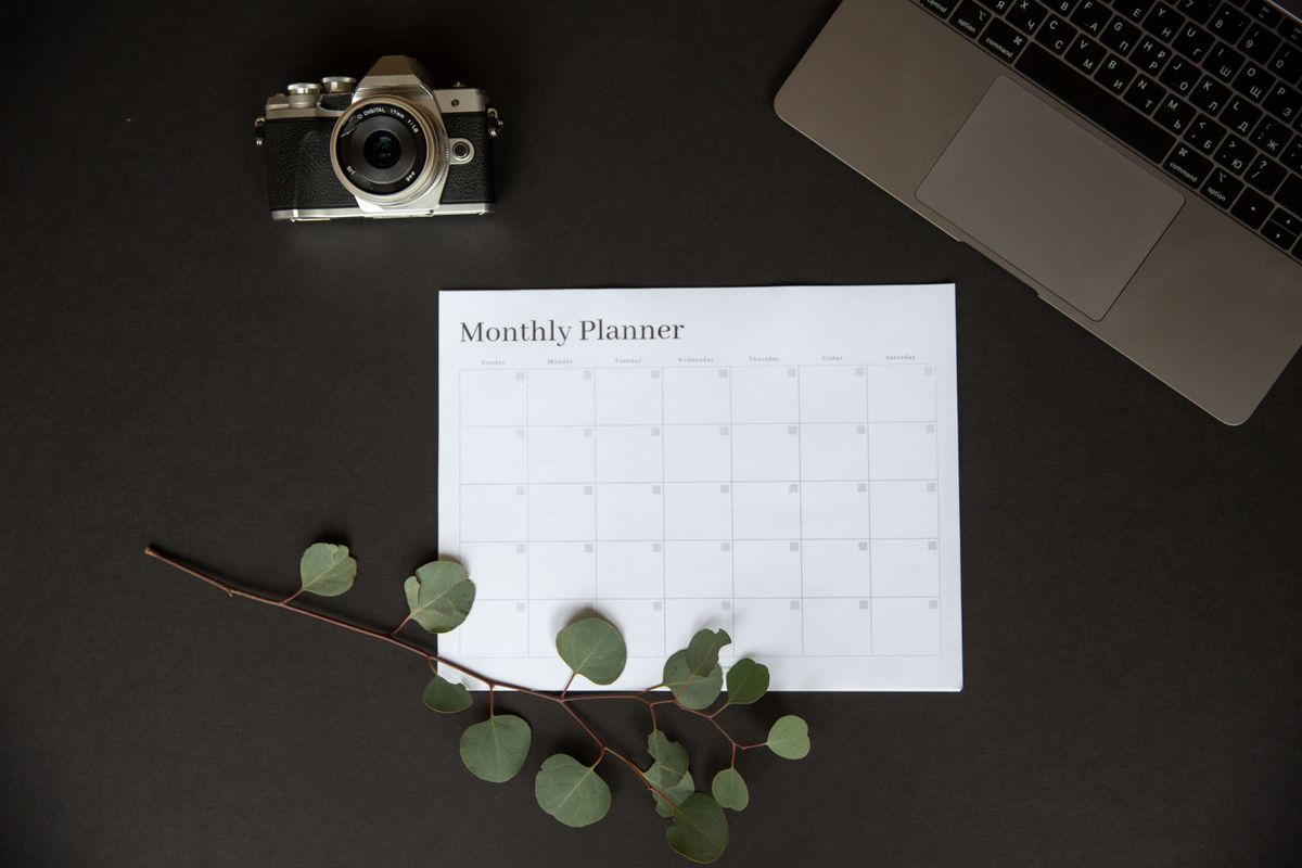 A monthly planner on a desk