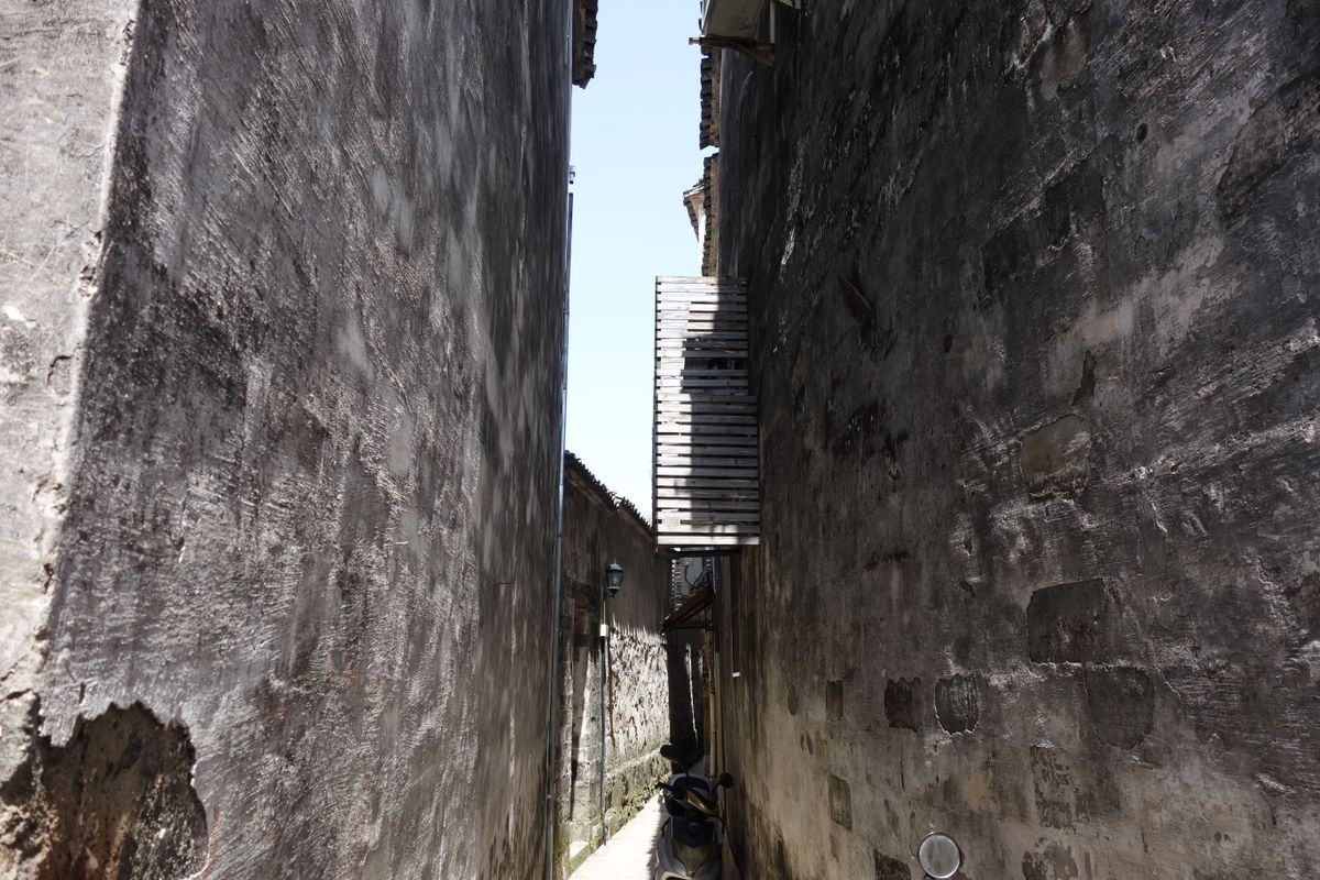 A narrow passage with steps