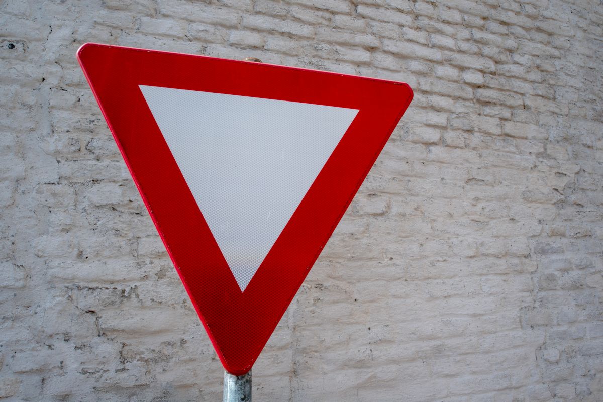 A red warning triangle sign A red warning triangle sign