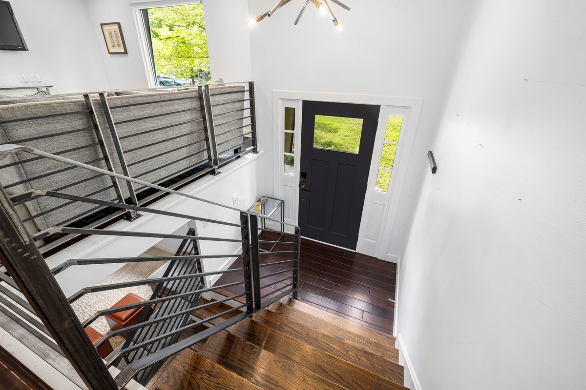 A staircase landing with a window A staircase landing with a window