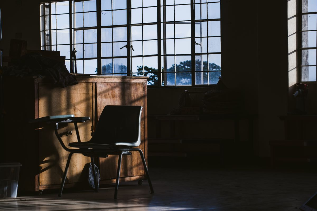 An empty chair in a quiet room