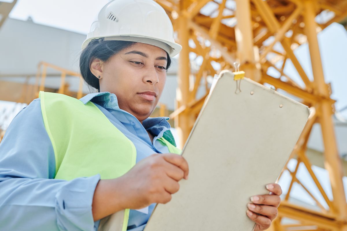 An engineer with an inspection checklist An engineer with an inspection checklist