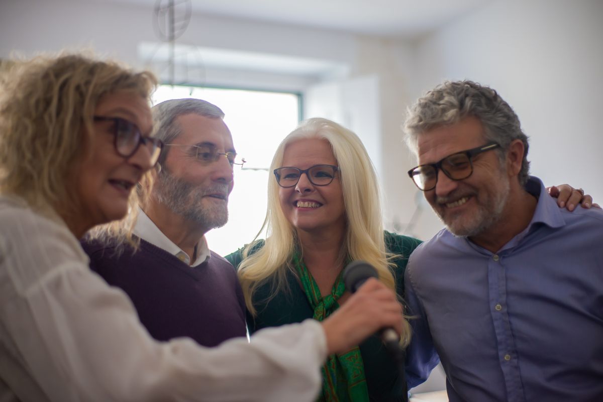 A group of older friends together A group of older friends together