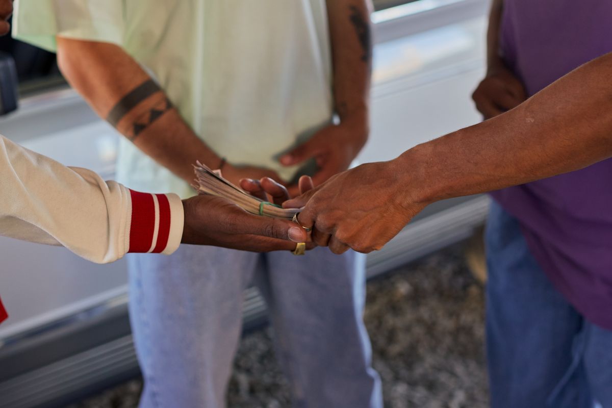 Handing over a cash payment