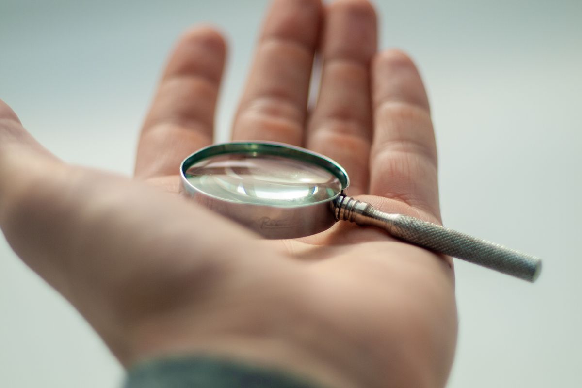 Inspecting an item with a magnifying glass