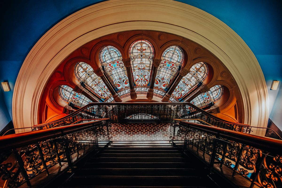 An ornate historic staircase An ornate historic staircase