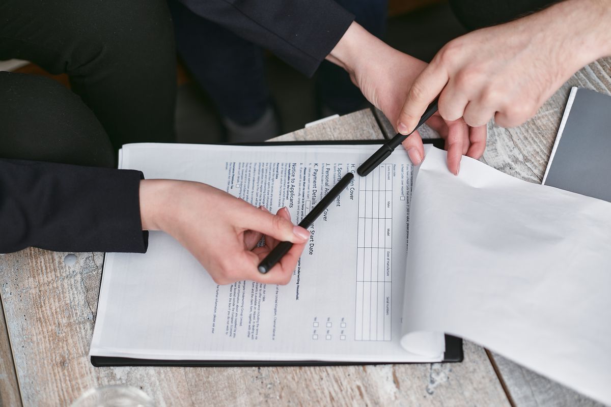 Signing a guarantee document Signing a guarantee document